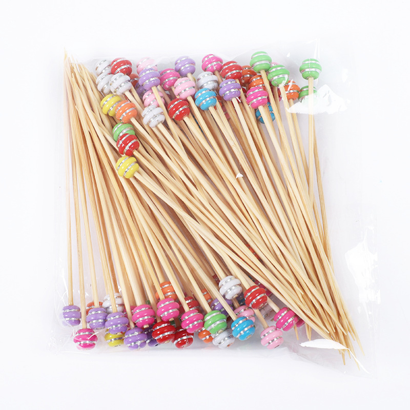 Bețișoare de fructe de unică folosință, cu design floral drăguț pe bețe de bambus, ideale pentru deserturi, sushi și decorarea fructelor.