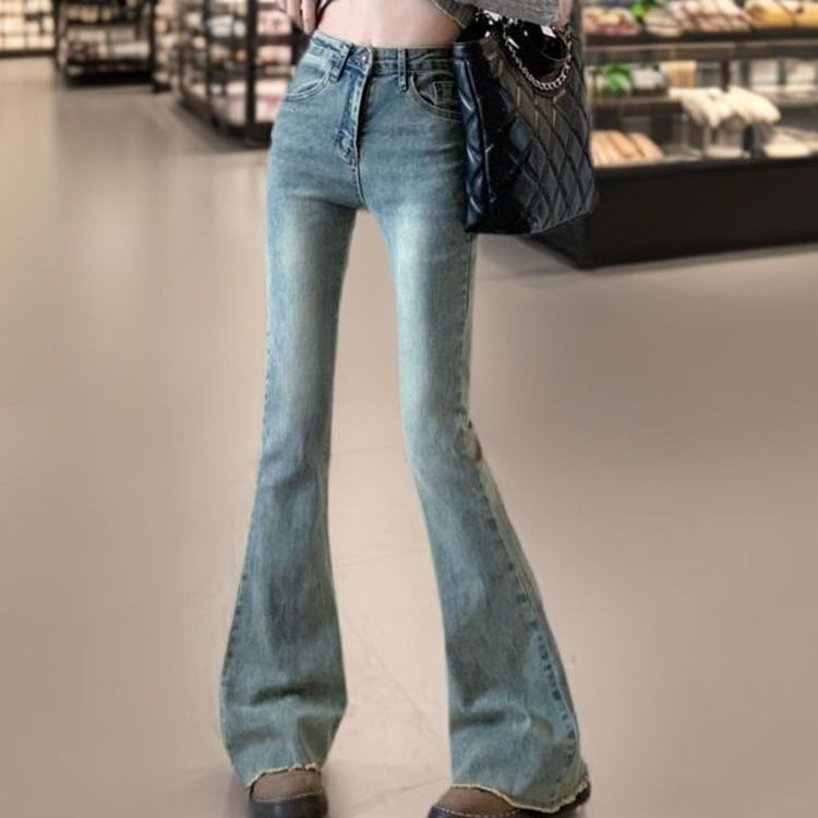 Jeans dama vintage cu tiv franjat, croi evazat, talie înaltă, slim, lungime până la podea, primăvara 2026