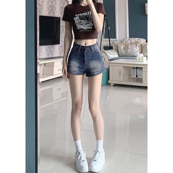 Shorturi din denim cu talie înaltă, stil vintage, detalii uzate, croială slim, talie elastică, vară 2025