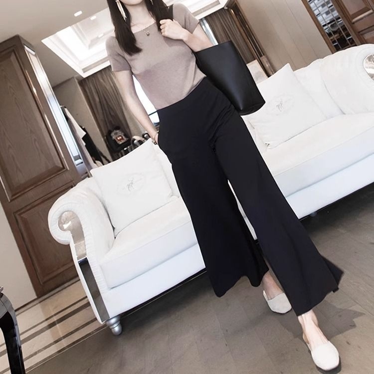 Pantaloni negri de damă, largi, ușor evazați, lungime cropped, material ușor de vară, croială lejeră, plus size