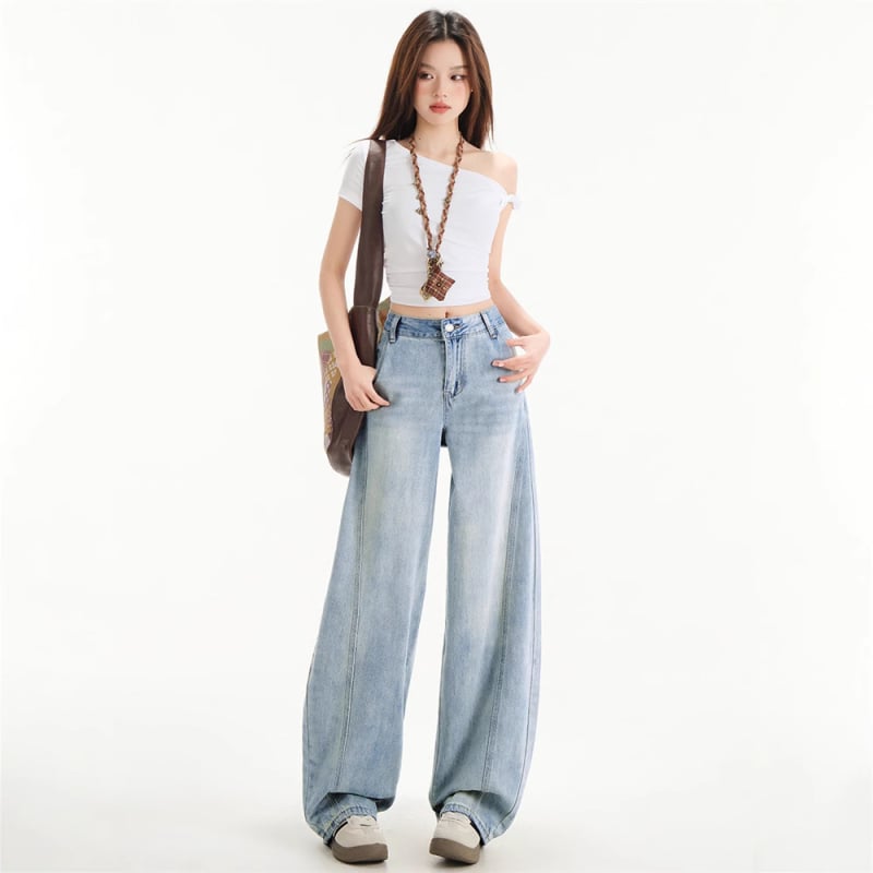 Jeansi din denim în stil american pentru femei, albastru deschis, croială în formă de sabie curbă, colecția primăvară-vară 2025, talie înaltă, croială largă, pantaloni denim cu picioare largi.