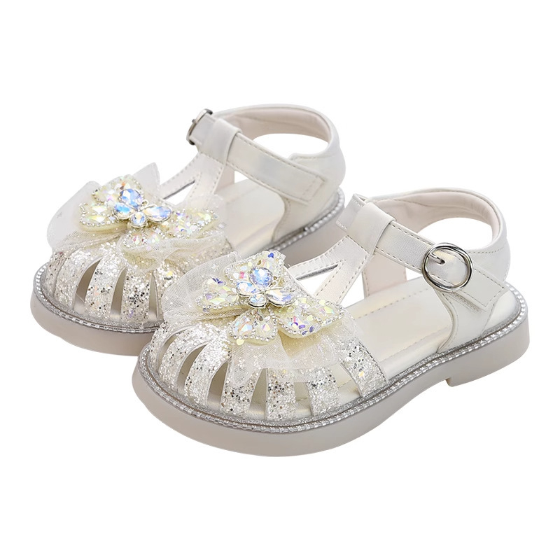 Sandale de prințesă pentru fete, vară 2026, talpă moale, deget închis, închidere Velcro, funda cu fluture și cristale