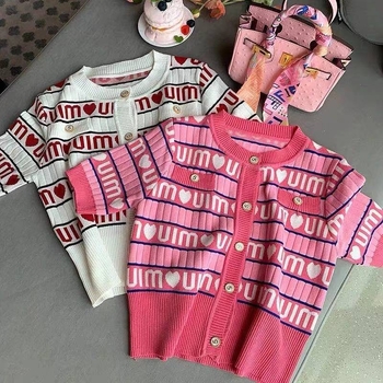 Top croptop tricotat cu mâneci scurte, în dungi, inspirat de stil Chanel, vară 2024
