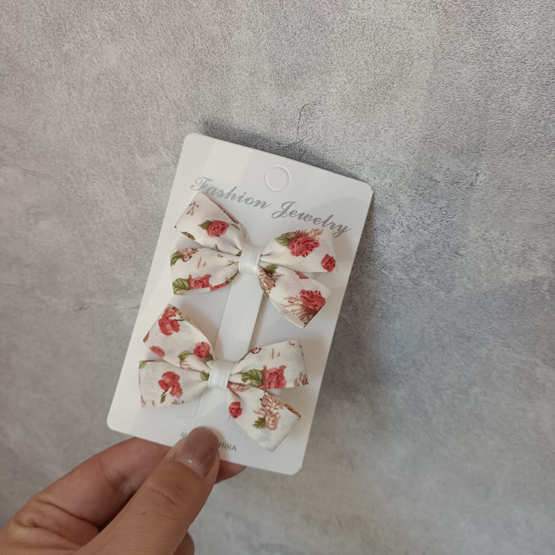 Clip de păr pentru copii cu funda albă cu flori mini