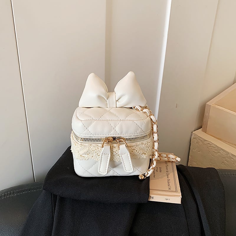 Geantă mini crossbody cu fundă și lanț, drăguță, la modă și versatilă.