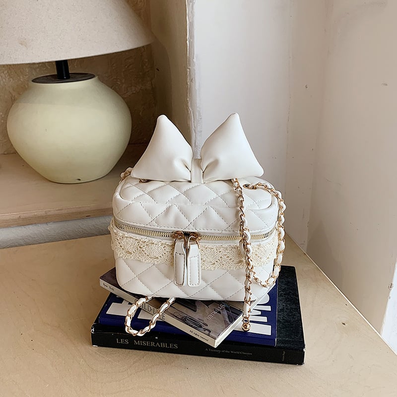 Geantă mini crossbody cu fundă și lanț, drăguță, la modă și versatilă.