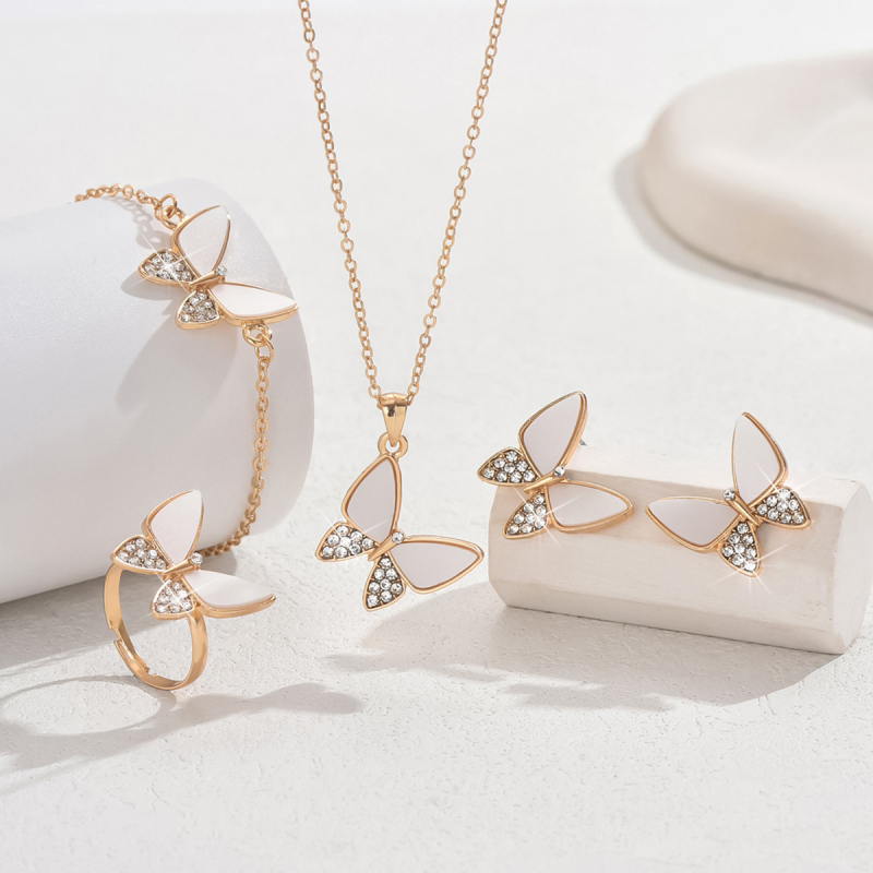 Set de bijuterii cu patru piese, cu motiv fluture: cercei, colier, inel și brățară, cu strasuri, feminin și elegant