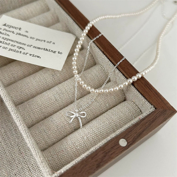 Colier femei cu pandantiv fundă, stil minimalist, cupru, lanț încrucișat, lungime 41–50 cm