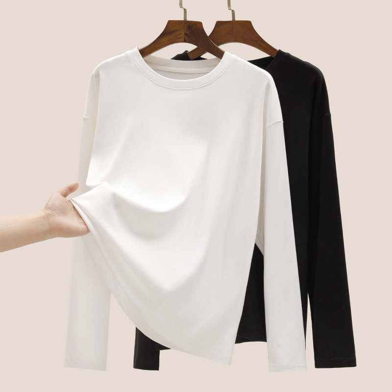 Γυναικείο μαύρο μακρυμάνικο T‑shirt σε μονόχρωμο σχέδιο, άνετη χαλαρή γραμμή, ελαφρύ ύφασμα, βασικό τοπ βάσης για στρώσεις, καθημερινή χρήση