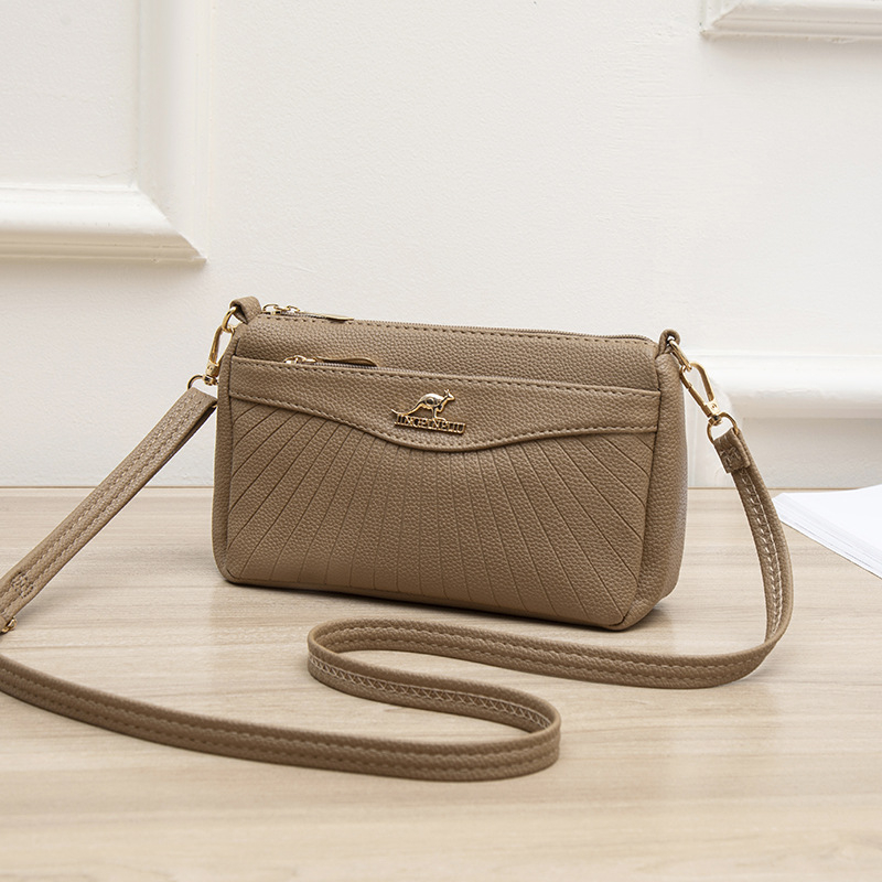 Γυναικεία crossbody τσάντα από μαλακό δέρμα, μικρός τετράγωνος σχεδιασμός, με πολλές θήκες