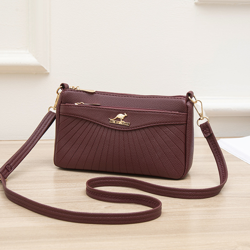 Γυναικεία crossbody τσάντα από μαλακό δέρμα, μικρός τετράγωνος σχεδιασμός, με πολλές θήκες
