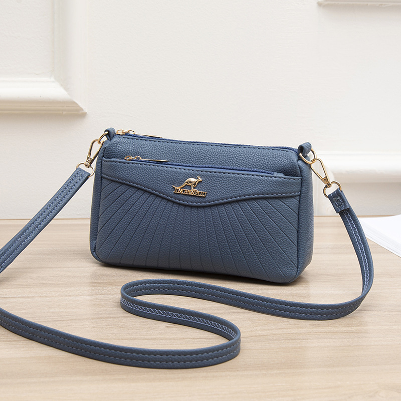 Γυναικεία crossbody τσάντα από μαλακό δέρμα, μικρός τετράγωνος σχεδιασμός, με πολλές θήκες