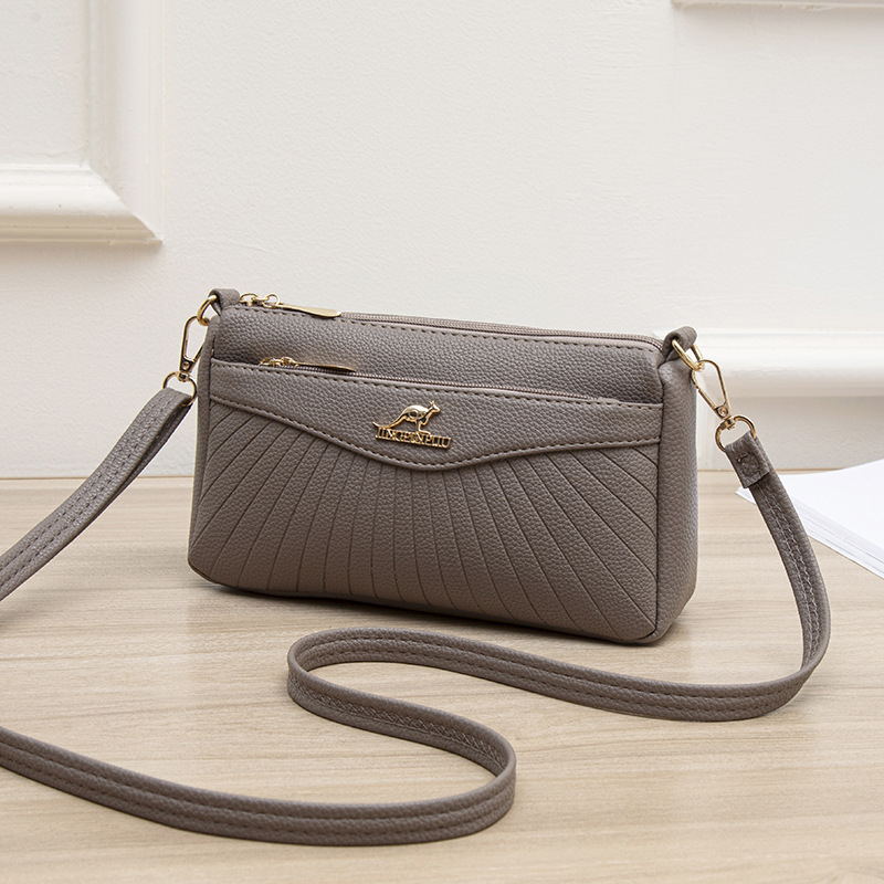 Γυναικεία crossbody τσάντα από μαλακό δέρμα, μικρός τετράγωνος σχεδιασμός, με πολλές θήκες