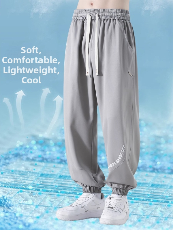 Pánske tepláky Ice Silk, leto 2025, tenké, rýchloschnúce, voľný strih, skrátené, stredne dlhý pás, bez opasku, sťahovací lem, potlač písmen, strečový polyester