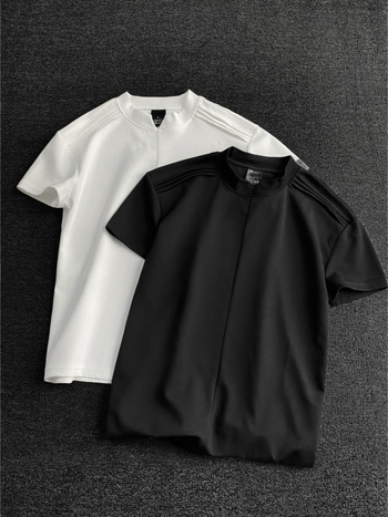 Αντρικό κοντομάνικο T‑shirt με στρογγυλή λαιμόκοψη, χαλαρή εφαρμογή, μονόχρωμο, καλοκαιρινό στυλ 2026
