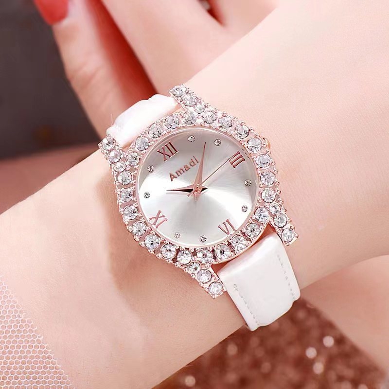 Γυναικείο ρολόι quartz με καντράν με ακτινοβολία ήλιου, διακοσμητικά κρύσταλλα και δερμάτινο λουράκι