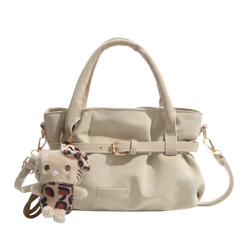Γυναικεία τσάντα crossbody σε ρετρό μινιμαλιστικό στυλ, μικρό τετράγωνο σχέδιο, καθημερινή χρήση, άνοιξη 2026