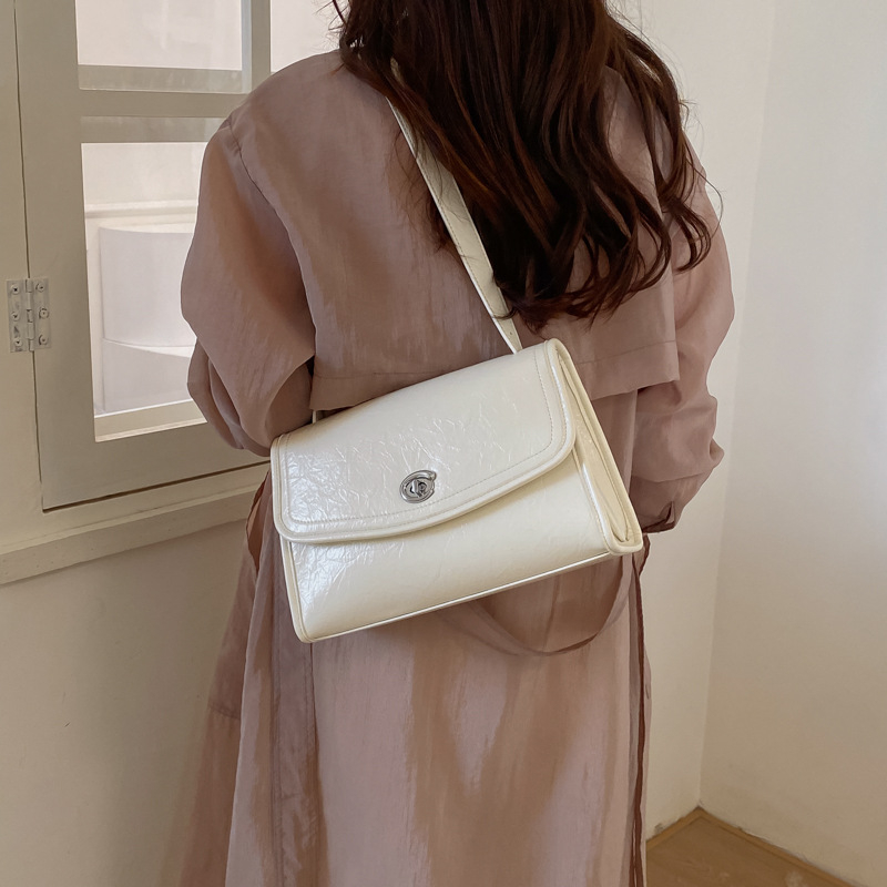 Γυναικεία crossbody τσάντα σε συνθετικό δέρμα, μικρού τετράγωνου σχήματος, κορεατικό στυλ καλοκαιρινής μόδας 2026