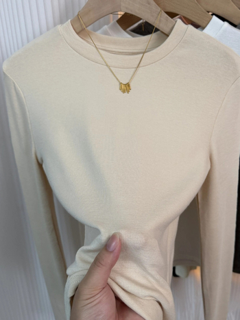 Γυναικεία αναπνεύσιμη γκρι μακρυμάνικη T‑shirt με στρογγυλή λαιμόκοψη, άνοιξη 2026, casual, ευέλικτη και ελαστική.