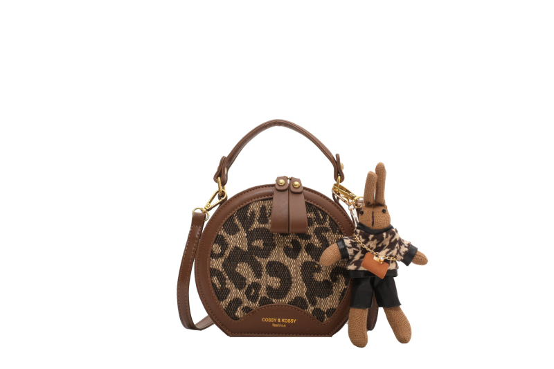 Geantă rotundă mică, quiltată, în stil Hong Kong, cu bretea crossbody