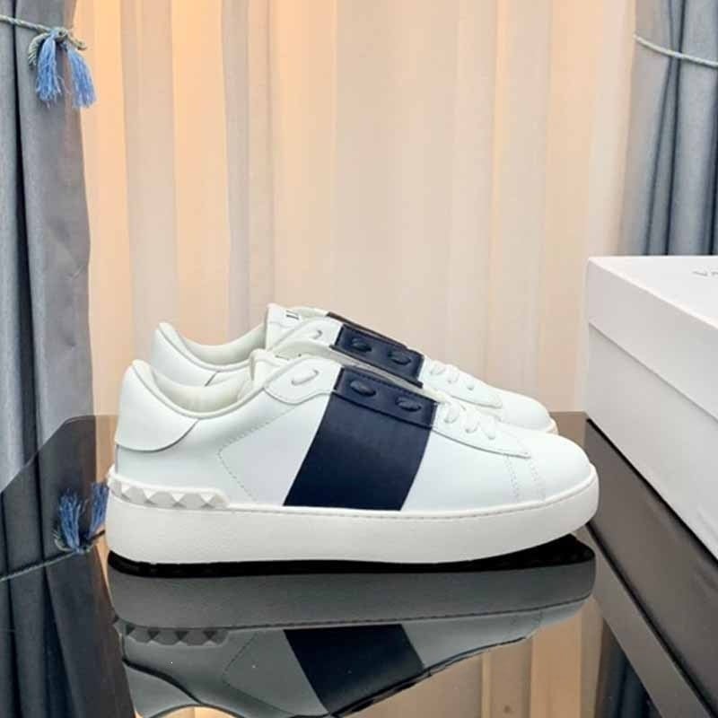 Bijele tenisice s zakovicama, koža prvog sloja, debeli đon, niskog profila, vezanje, unisex