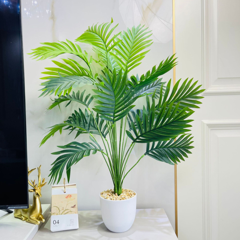 Umjetne biljke za kućni dekor: aranžman za dnevni boravak s Monstera deliciosa, banana biljka i Areka palma, skandinavski stil