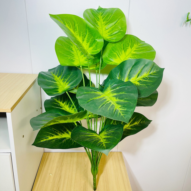Umjetne biljke za kućni dekor: aranžman za dnevni boravak s Monstera deliciosa, banana biljka i Areka palma, skandinavski stil