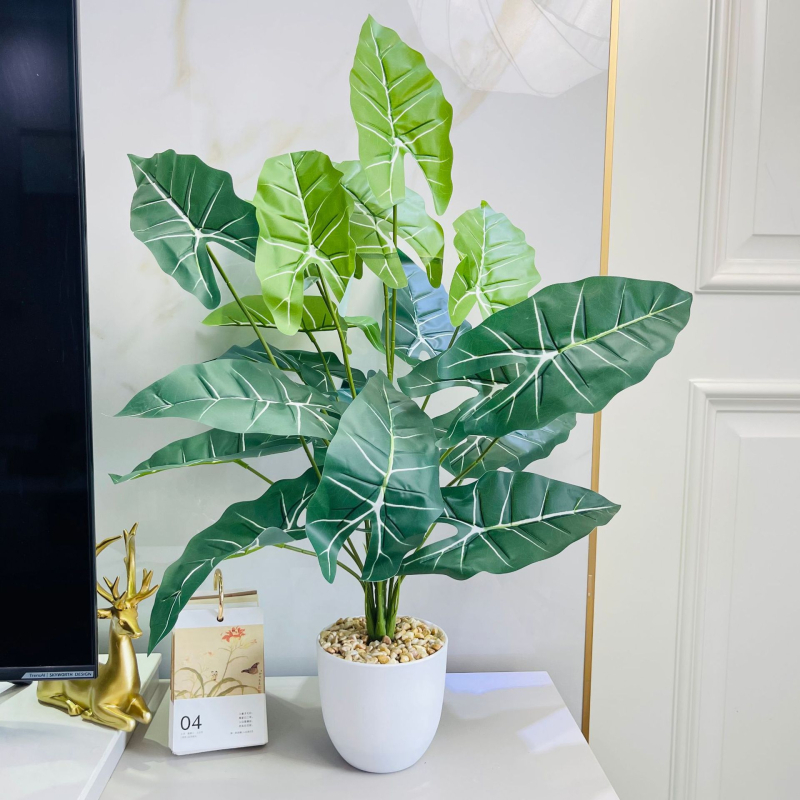 Umjetne biljke za kućni dekor: aranžman za dnevni boravak s Monstera deliciosa, banana biljka i Areka palma, skandinavski stil