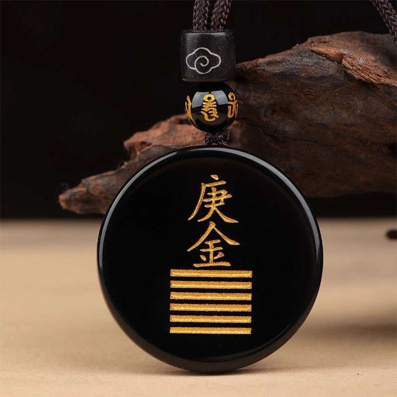 Gravirani obsidijan privjesak s vodnim elementom i energetski talisman