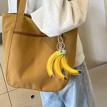 Novi slatki privjesak za torbu u obliku voća, s jedinstvenim dizajnom, banana i breskva, PU kožni privjesak za ključeve