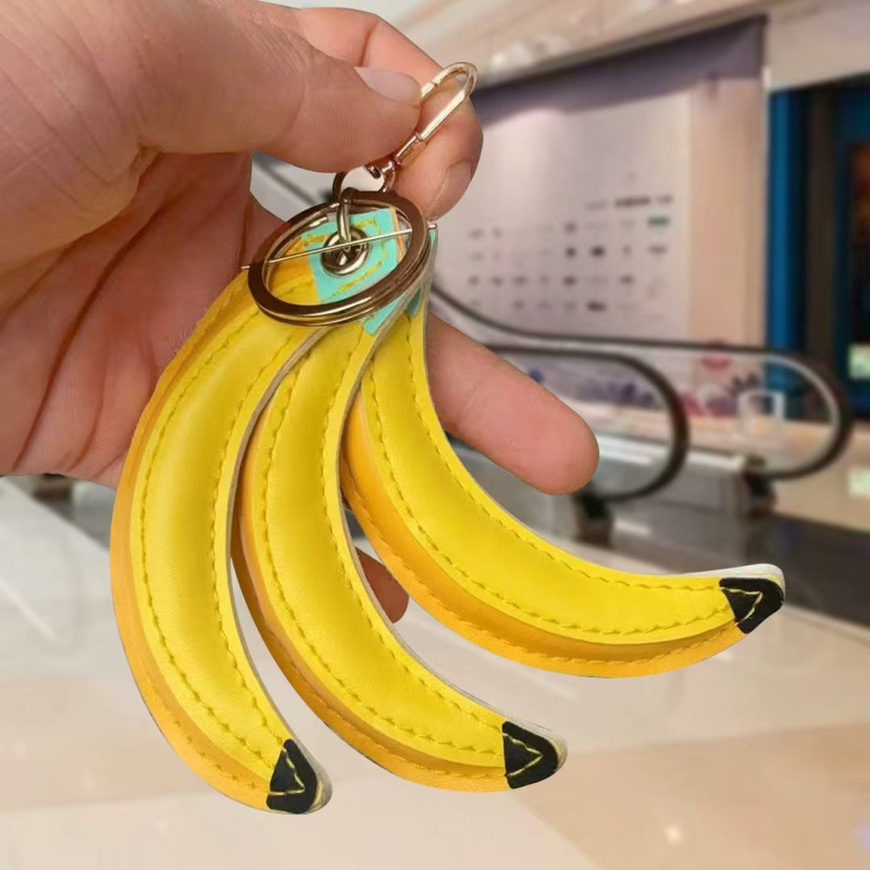 Novi slatki privjesak za torbu u obliku voća, s jedinstvenim dizajnom, banana i breskva, PU kožni privjesak za ključeve