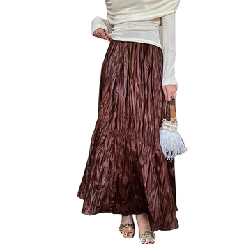 Trudničarska kožna suknja — jesenji francuski stil, retro elegantna, nepravilni plisirani detalji, srednja duljina, A-linija