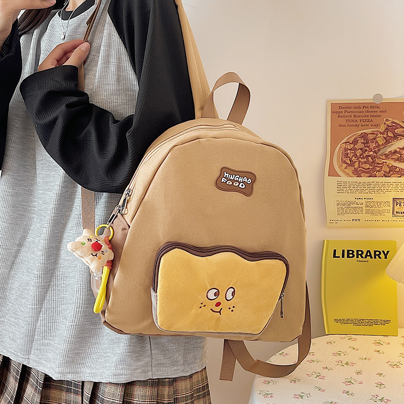 Új kartún toast témájú alsó tagozatos iskolai hátizsák, uniszex, aranyos és friss design, két vállpánttal.