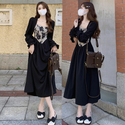 Crna haljina za punije veličine s kvadratnim izrezom, dugi rukavi, A-kroj siluete, vizualno sužava struk, jesen-zima 2025