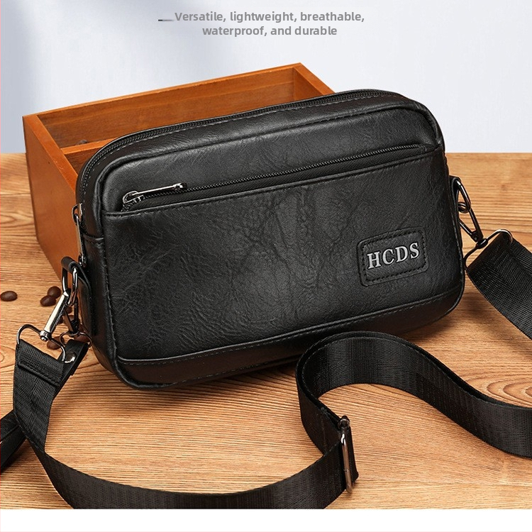 Geantă de umăr pentru bărbați, capacitate mare, casual, impermeabilă și rezistentă la uzură, crossbody cu logo, stil business casual.