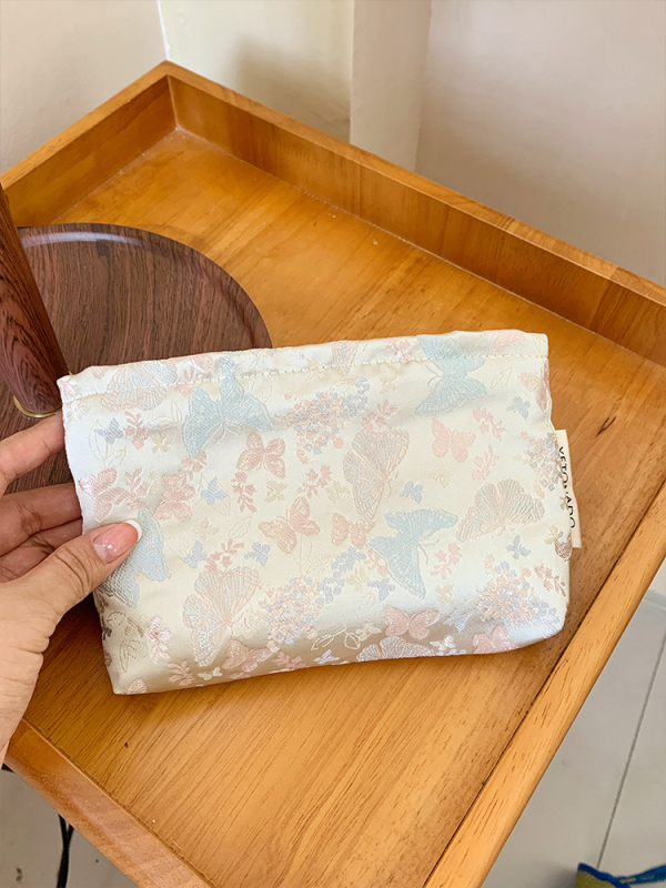 Jacquard mintás pillangó kozmetikai táska, nagy kapacitású, hordozható utazáshoz; tároló tasak és tolltartó.