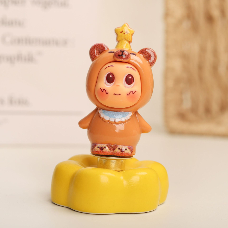 Rotálható állati alakú csillag figura az autó műszerfalára és irodai dekorációhoz