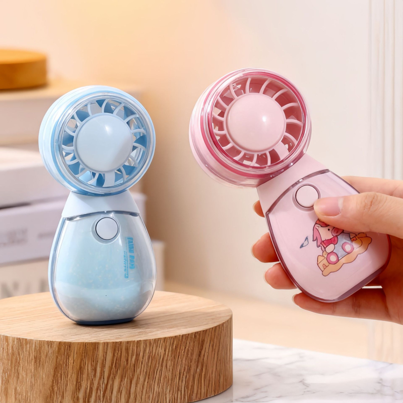 Roztomilý ručný mini ventilátor s tromi rýchlosťami a okrúhlym dizajnom v tvare domáceho maznáčika, ktorý sa dá nabíjať cez USB.