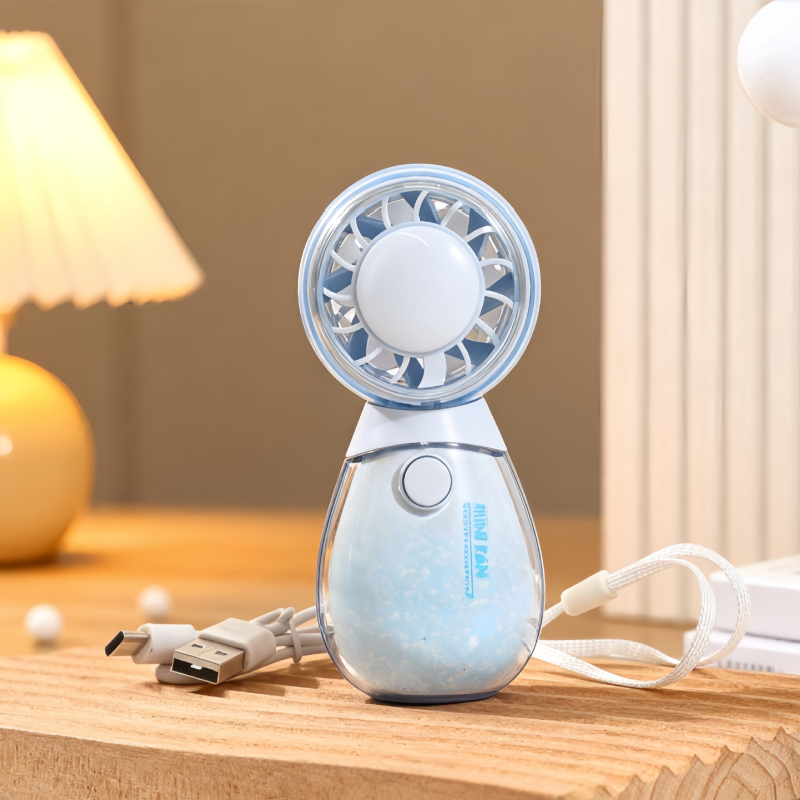 Roztomilý ručný mini ventilátor s tromi rýchlosťami a okrúhlym dizajnom v tvare domáceho maznáčika, ktorý sa dá nabíjať cez USB.