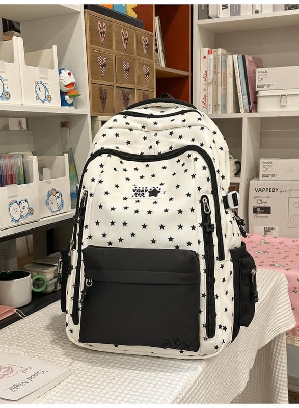 Dicarlo rucsac școlar ușor, cu mai multe compartimente, într-o nuanță albastru lăptos cu finisaj sărat, model geometric, compartiment pentru laptop de 10 inch
