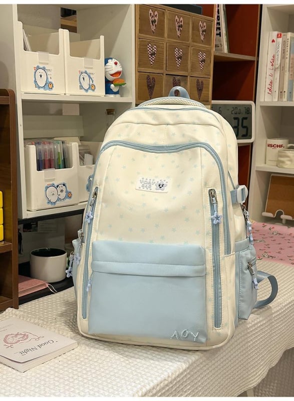 Dicarlo rucsac școlar ușor, cu mai multe compartimente, într-o nuanță albastru lăptos cu finisaj sărat, model geometric, compartiment pentru laptop de 10 inch
