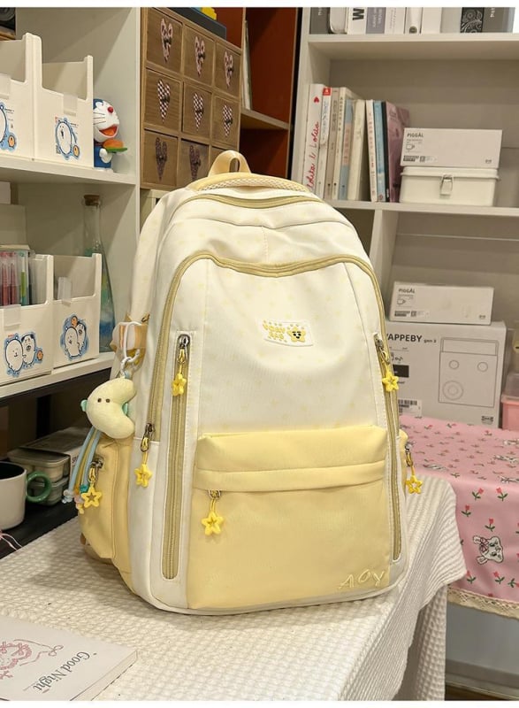 Dicarlo rucsac școlar ușor, cu mai multe compartimente, într-o nuanță albastru lăptos cu finisaj sărat, model geometric, compartiment pentru laptop de 10 inch