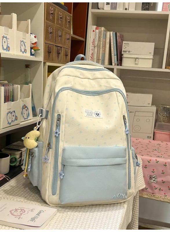 Dicarlo rucsac școlar ușor, cu mai multe compartimente, într-o nuanță albastru lăptos cu finisaj sărat, model geometric, compartiment pentru laptop de 10 inch