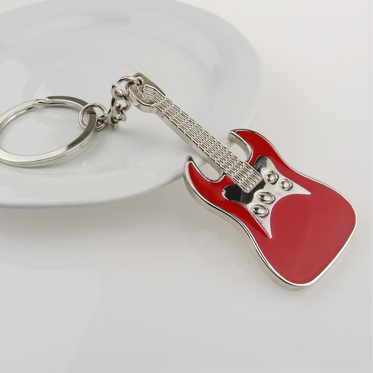 Breloc metal cu notă muzicală – design modern, cadou elegant