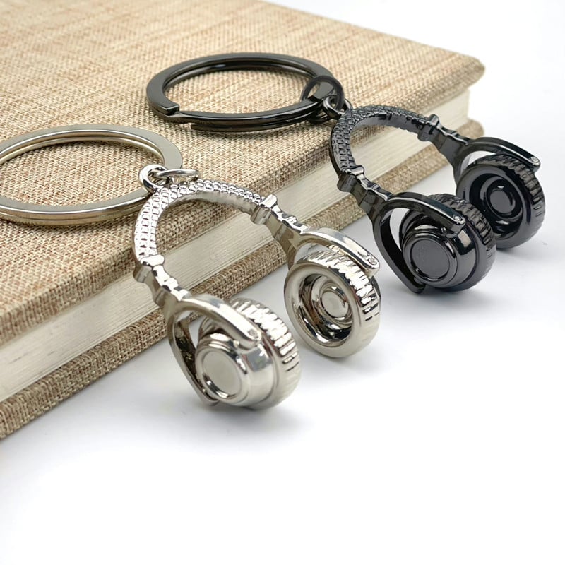 Breloc metal cu notă muzicală – design modern, cadou elegant
