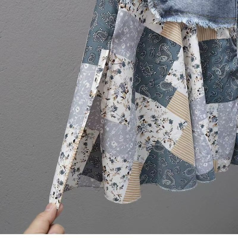 Patchwork denim szoknya nőknek, magas derék, midi hosszúság, 2026 nyár, hímzett részletek, sokoldalú divat, optikai karcsú vonal, trendes európai stílus