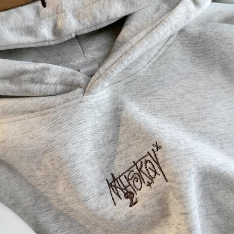 Női hímzett kapucnis pulóver, vastag fleece belsővel, laza szabás, kapucnival