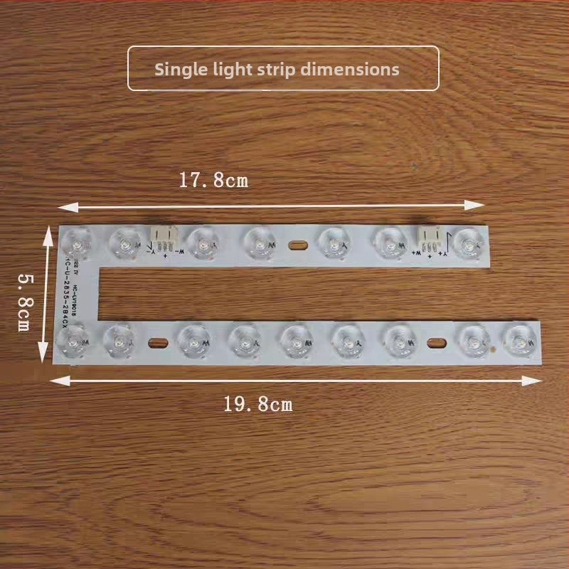 Tri LED pásy v tvare U s bielymi jadrami a kruhovými šošovkovými svetelnými zdrojmi pre stropné svietidlá, vhodné do obývačky a spálne