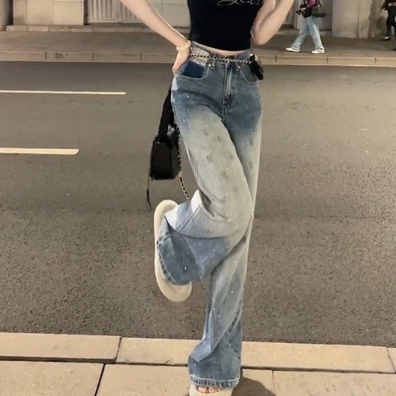 Női amerikai stílusú széles lábú farmer, magas derekú, egyenes szabás, mosott denim, köves díszítés gradiensek