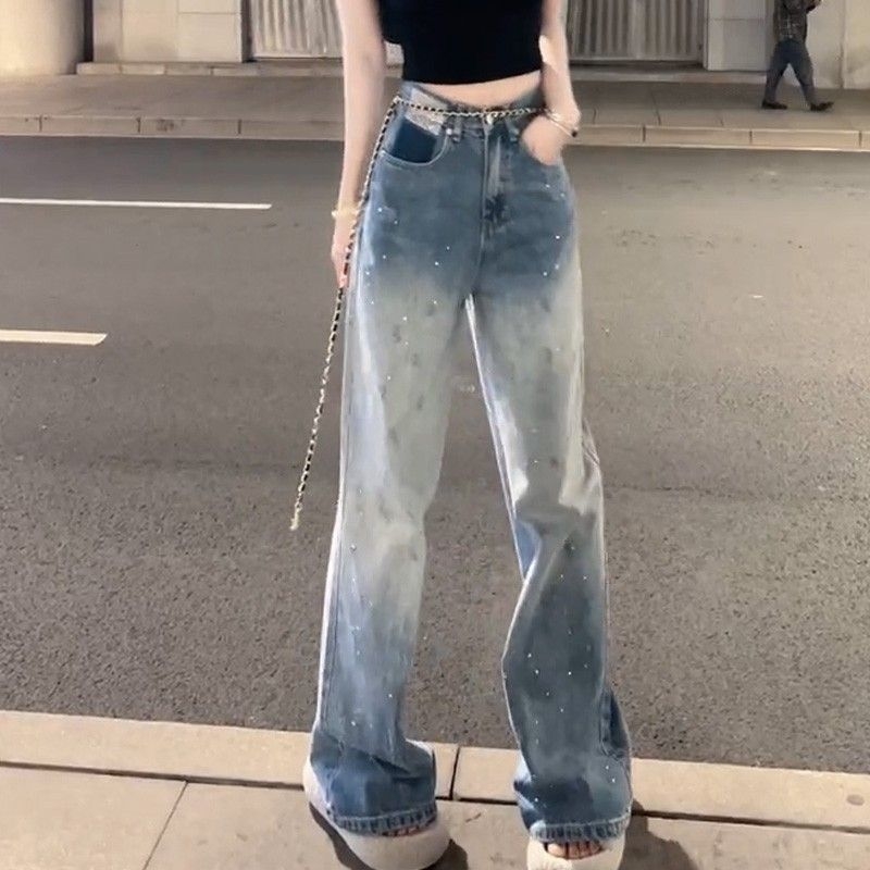 Női amerikai stílusú széles lábú farmer, magas derekú, egyenes szabás, mosott denim, köves díszítés gradiensek